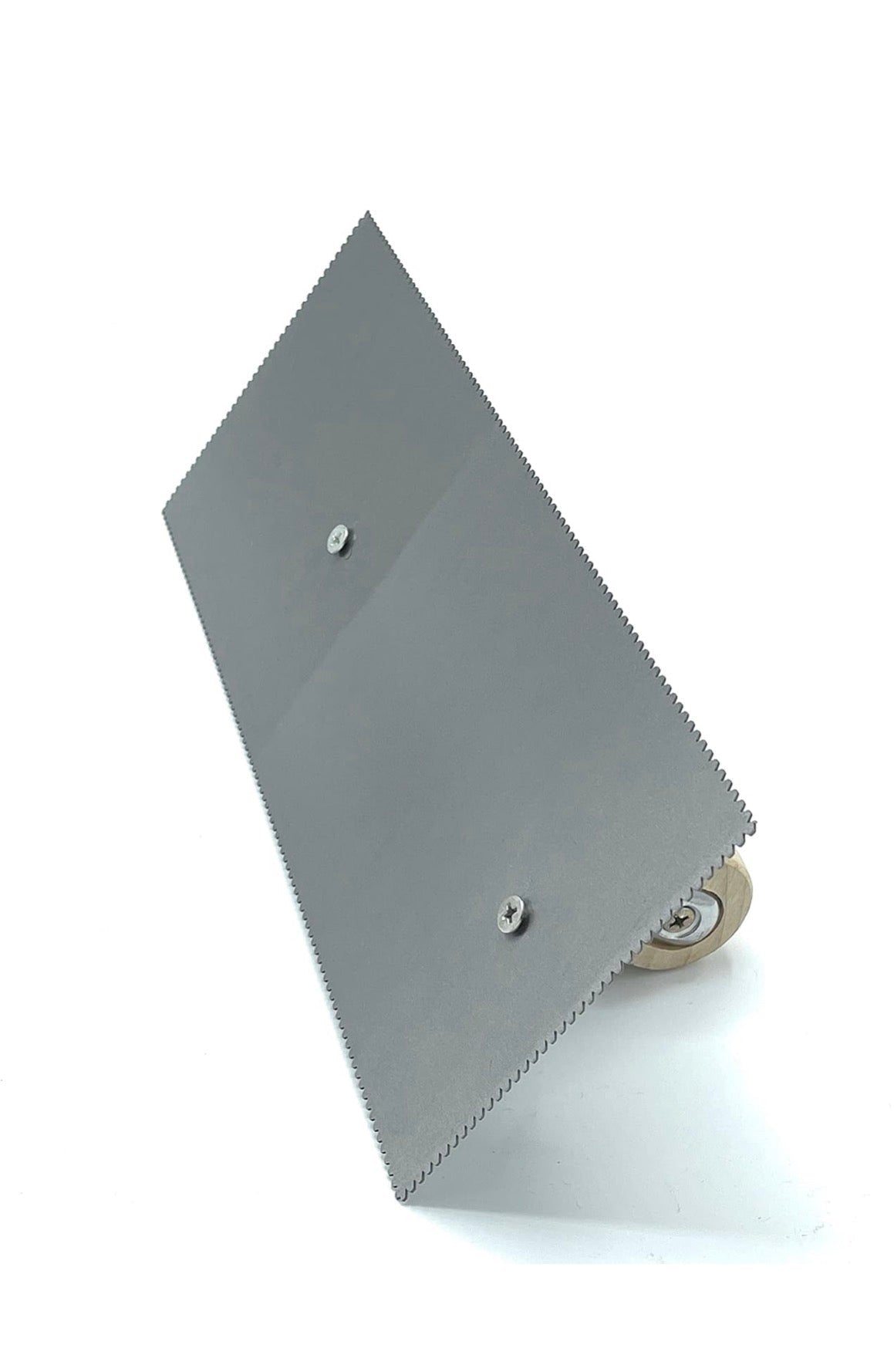 CCA A2 V-notch trowel with wooden handle for even LVT adhesive spreading. | Tempered steel with four-sided at 1mm x 3mm notches for even pressure-sensitive adhesive spreading.