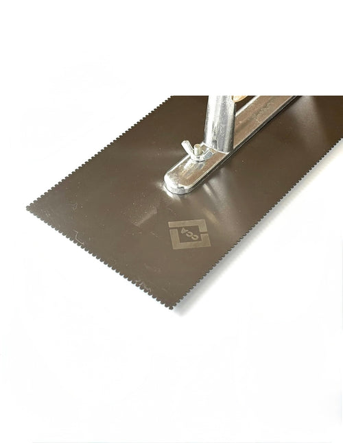 CCA A2 V-notch trowel with wooden handle for even LVT adhesive spreading. | Tempered steel with four-sided at 1mm x 3mm notches for even pressure-sensitive adhesive spreading.